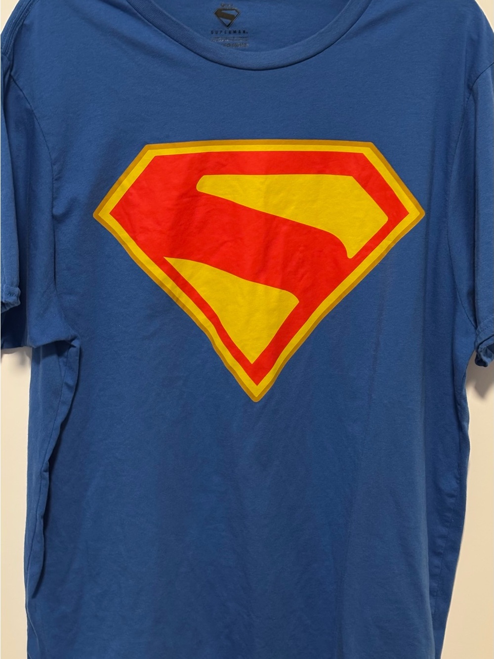 Source Unknown Blue Short-Sleeve Tee with Red and Yellow Shield Graphic